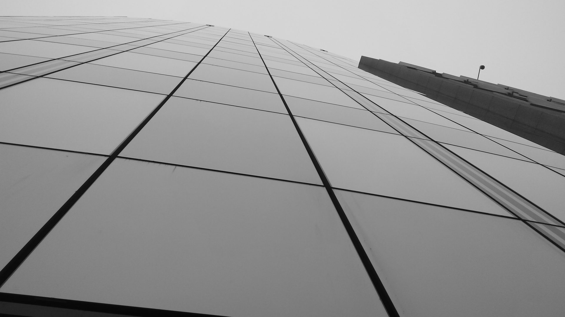 A skyscraper, black and white, very artsy and also royalty-free